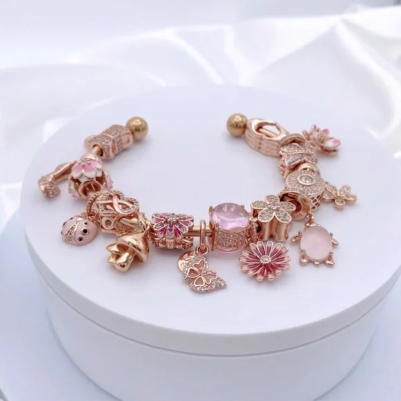 Linx Rose Gold Stainless Steel Open Bangle with Pink Themed Charms